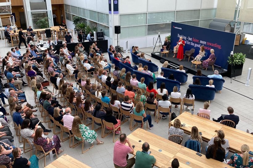 A group of people at a conference for Nationwide