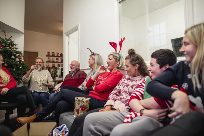 Colleagues during a game at the office Christmas part