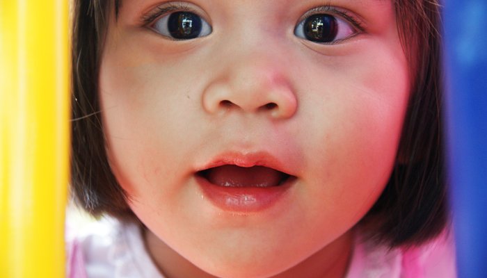 Colourful close up of happy young girl