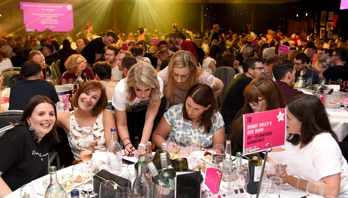 Happy group at Never Mind the Business music quiz