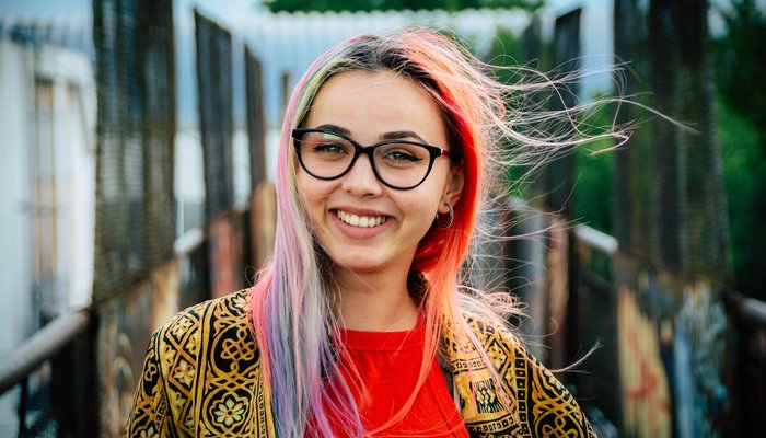 Happy teenager with colourful hair