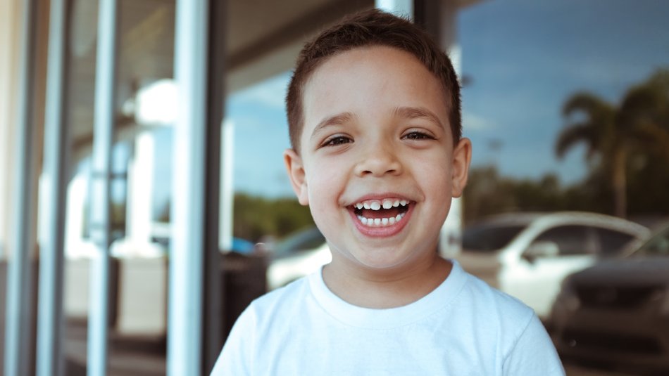 happy young boy outdoors
