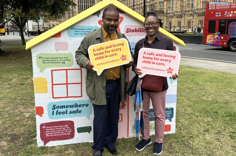 Karis and Godfrey standing in front of Houses of Parliment