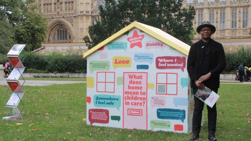 Ronnie Archer Morgan standing outside Houses of Parliment for children in care campaign