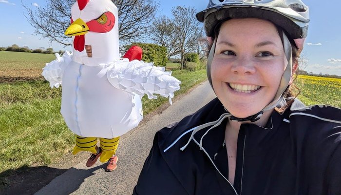 Sebastian Burley and wife training in his chicken costume for the London Marathon for Action for Children