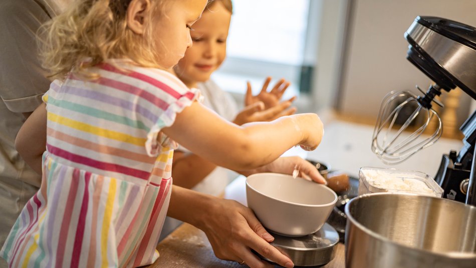 Child baking in kitchen
