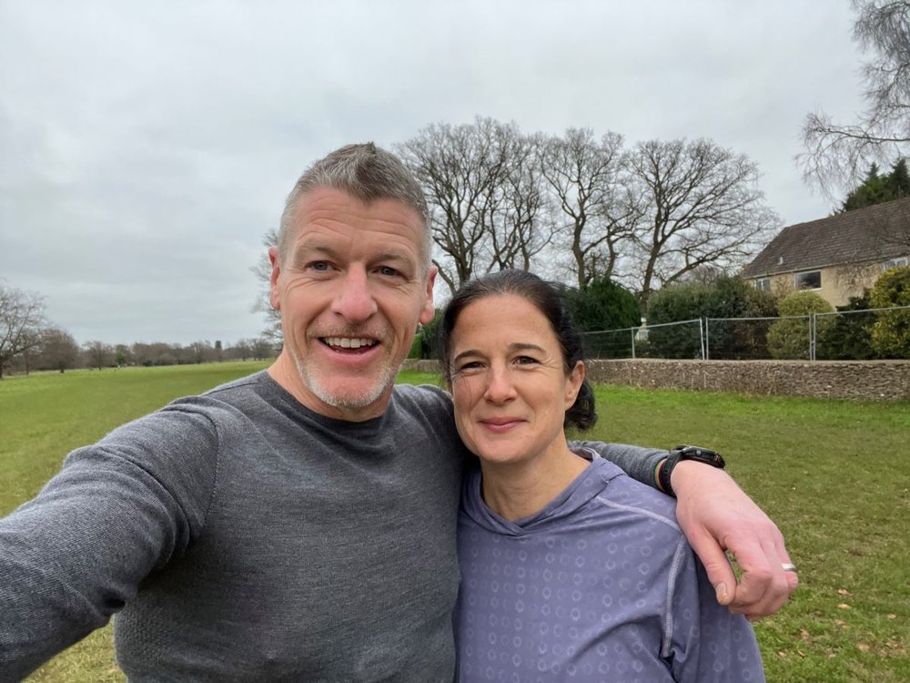Vicky and her partner taking a selfie outdoors