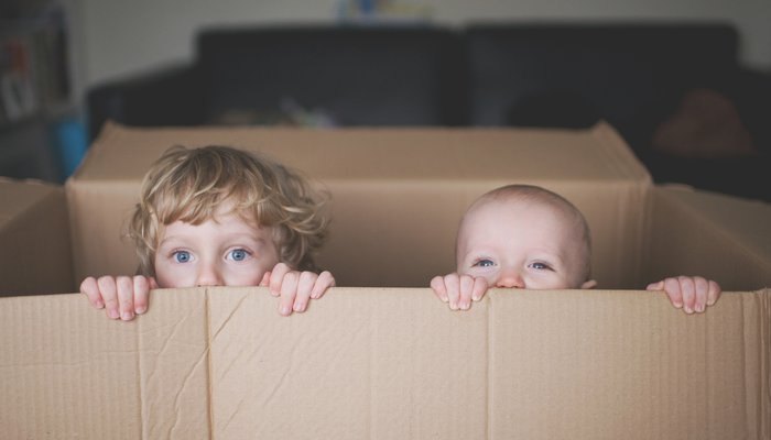 Young boys playing in box