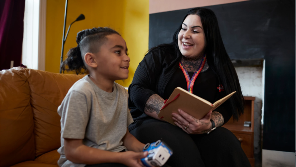 Action for Children support worker talking to boy