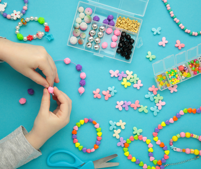 Making handmade jewellery using beads