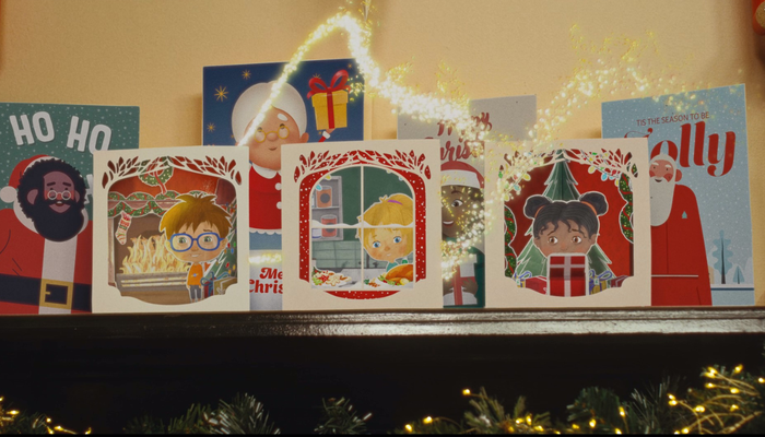 Secret Santa Christmas TV ad Festive mantlepiece with Christmas cards showing ilutrations of three happy children